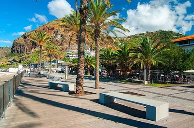 a house with a patio with a roof at Paradise Valley Ribeira Brava in Ribeira Brava