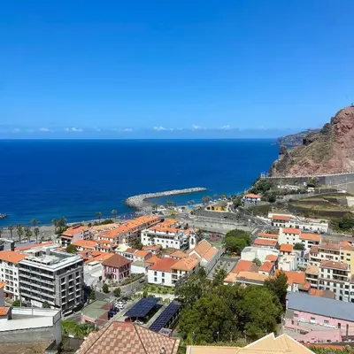 an aerial view of a city and the ocean at Paradise Valley Ribeira Brava in Ribeira Brava