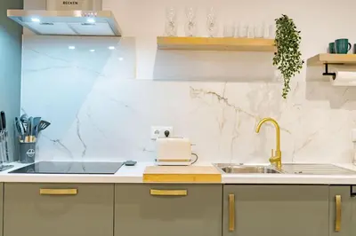 a kitchen with a sink and a counter top at Vienna apartment Alpine escape villa in Gaula