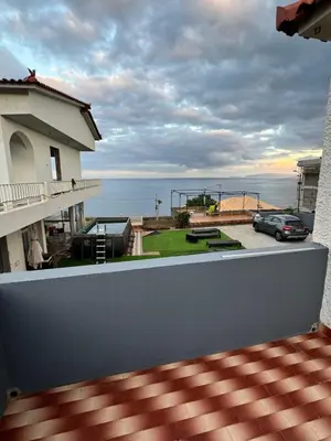 a view of the ocean from the balcony of a house at LOV - Lombadinha Ocean View in Gaula