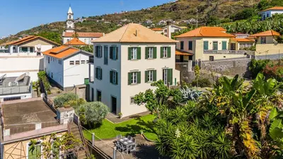 an aerial view of a city with houses at Calheta Traditional in Arco da Calheta