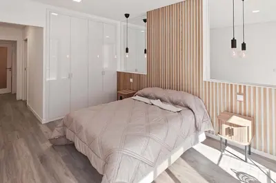 a bedroom with a large bed in a room at Holiday Beach in Machico