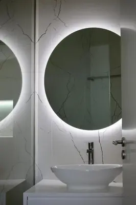 a bathroom with a sink and a mirror at Like Home II - casa espaçosa com 3 quartos e vista mar in Funchal