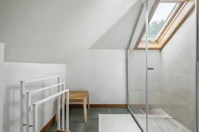 a staircase in a house with a skylight at Villa Piedade by Homie in Canhas