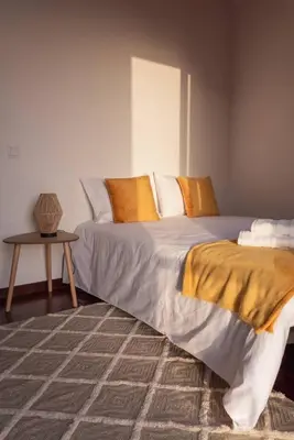 a bathroom with a glass shower and a sink at João Loft I by Mth in Campanário