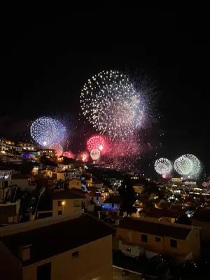 a firework display in a city at night at Cantinho dos M&M in Funchal