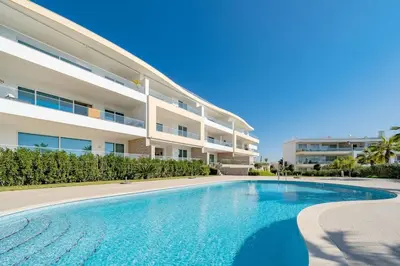 a swimming pool in front of a building at MaBelle Luxury Ocean View Apartment in Lagos