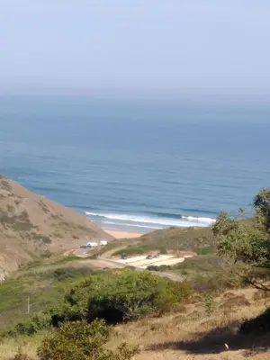 a view of a beach with the ocean in the background at Brisas da Raposeira in Raposeira