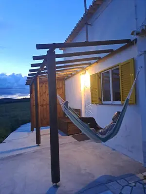a bathroom with a sink and a shower at Brisas da Raposeira in Raposeira