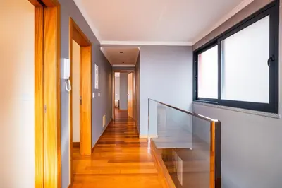 a bedroom with a bed and a wooden floor at Tyler House Funchal in Funchal