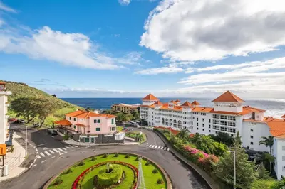 a view of a city with the ocean in the background at Exquisite Ocean Apartment by Homie in Caniço