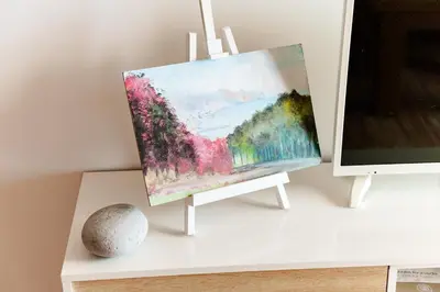 a painting sitting on a stand next to a tv at GuestReady - Marvellous ocean view in Caniço in Caniço