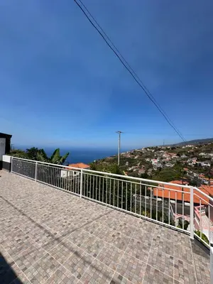 a balcony with a view of the ocean at Little Blue Paradise in Ribeira Brava