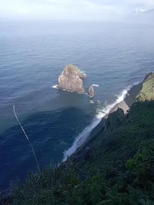 an island in the middle of the ocean at Village Sun House - Porto Moniz in Porto Moniz