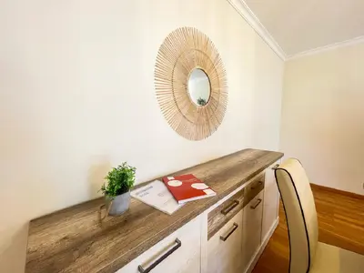 a room with a wooden counter and a mirror at Suite Elizabeth in Funchal