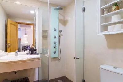 a bathroom with a shower and a sink at GuestReady - Ocean-View Retreat in Caniço in Caniço