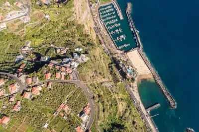 an overhead view of a map of a harbor at Sunset House in Calheta