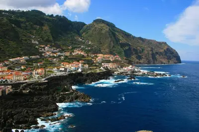 an aerial view of a village on a mountain at Pôr do Sol I in Porto Moniz