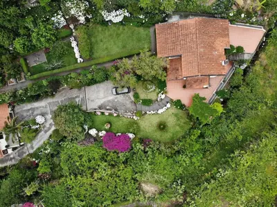 an overhead view of a house with a garden at Quinta O Refúgio in São Vicente