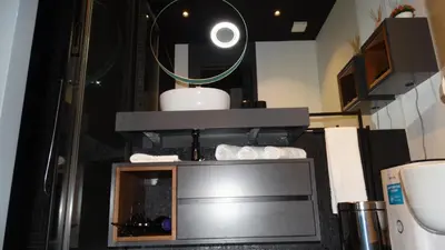 a bathroom with a sink and a mirror at Heaven and Sea in Madeira in Funchal