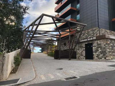 awning over a sidewalk in front of a building at Heaven and Sea in Madeira in Funchal