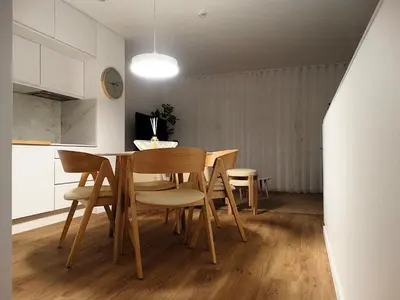 a dining room table and chairs in a kitchen at CA Tanoeiros 2 in Funchal