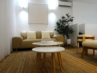 a living room with a couch and a table at CA Tanoeiros 2 in Funchal