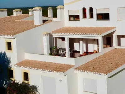 an aerial view of a house with white walls and roofs at Apartamento Branco Beliche in Sagres