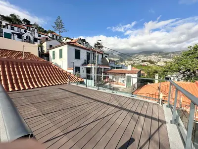 two chairs sitting on top of a balcony at Private Rooftop Sunny Terrace in Funchal in Funchal
