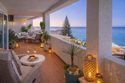 a balcony with a view of the ocean at Bliss Luz Horizon - Panoramic Sea View - 50m to Beach - Central Praia da Luz - Walk distance to Everywhere in Luz