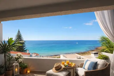 a balcony with a view of the ocean at Bliss Luz Horizon - Panoramic Sea View - 50m to Beach - Central Praia da Luz - Walk distance to Everywhere in Luz