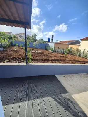 a view of a garden from the porch of a house at Litlle Zen House in Santana