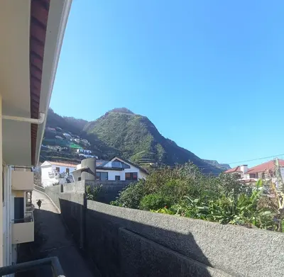 an aerial view of a town with the ocean at Village Sea House - Porto Moniz in Porto Moniz