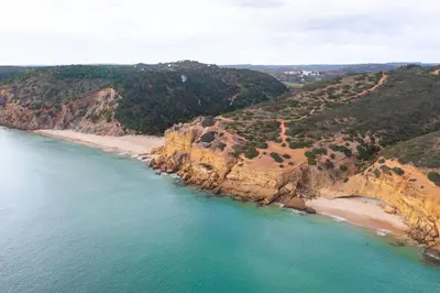 an aerial view of a beach next to the ocean at Chalet du Solei- V022 in Salema