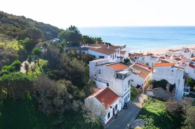 an aerial view of a village and the beach at Chalet du Solei- V022 in Salema