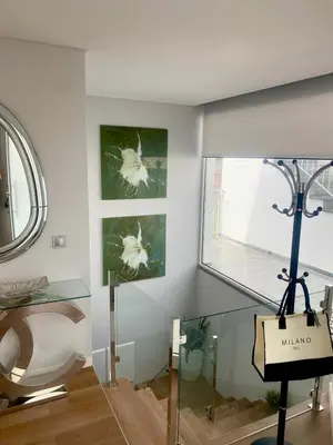 a room with a glass table and a window at Vila Da Luz Calheta in Estreito da Calheta