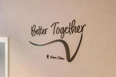 a wall with a sign that says better together at Better together funchal 2 in Funchal