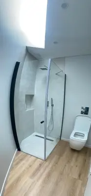 a bathroom with a shower and a toilet at Sun Temple by Madeira Holiday Rentals in Ribeira Brava