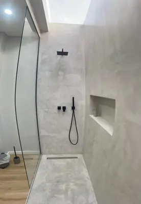 a bathroom with a shower with a shower head at Sun Temple by Madeira Holiday Rentals in Ribeira Brava