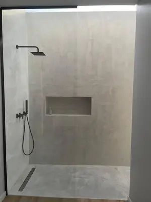 a shower with a glass door in a bathroom at Sun Temple by Madeira Holiday Rentals in Ribeira Brava