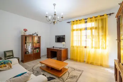 a living room with a couch and a table at Villa Ocean Bay Funchal By Empório in Funchal