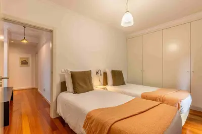 a bedroom with two beds in a room at GuestReady - Relax in Style in Funchal in Funchal