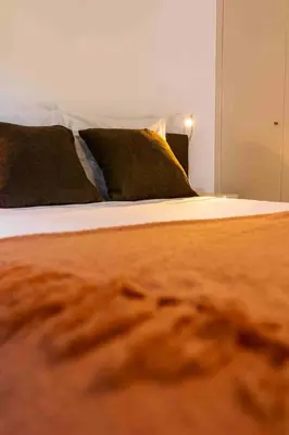 a close up of a bed in a bedroom at GuestReady - Relax in Style in Funchal in Funchal