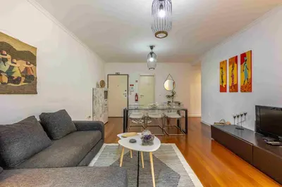 a living room with a couch and a table at GuestReady - Relax in Style in Funchal in Funchal