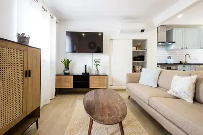 a living room with a couch and a table at CASA Castelejo in Vila do Bispo