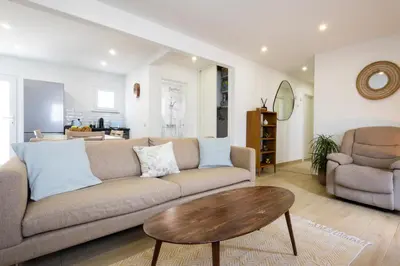 a living room with a couch and a coffee table at CASA Castelejo in Vila do Bispo