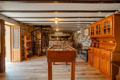 a game room with a foos ball on a table at Casa Levada dos Prazeres by Stay in Prazeres