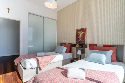 two beds in a room with two beds sidx sidx sidx at Villa Carlota by Holiday Rental Madeira in Caniço