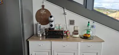 a counter in a room with a counter at Sally's Loft - Penthouse - Honeymoon suite in Ponta do Sol