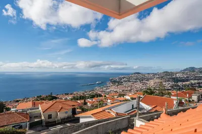 a view of the ocean from a city at Madeira Friendly Guest House by An Island Apart in Funchal